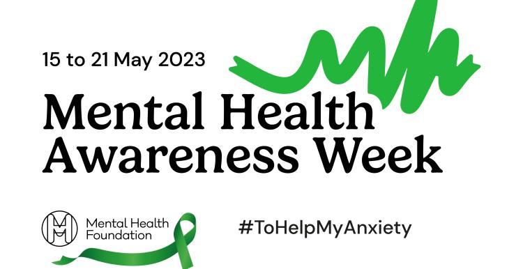 A mental health awrenss logo, black writing on a white background with a hashtag that reads to help my anxiety. A green ribbon is above the black text. 