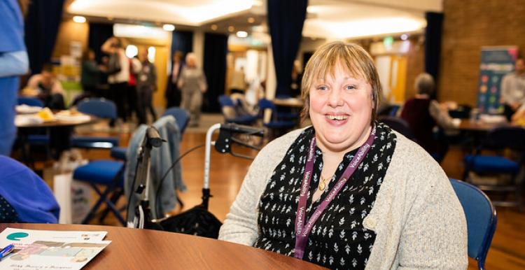 Woman at a patient co-production group