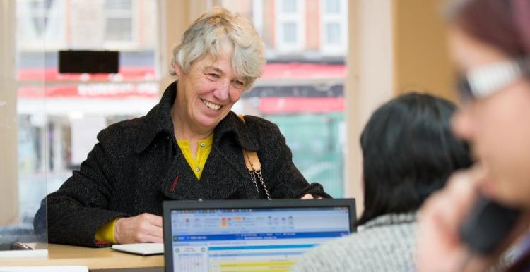 Woman at a reception desk