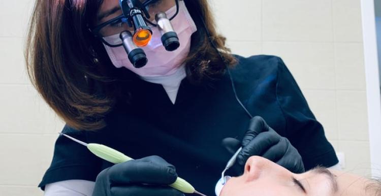 A dentist treating a patient 