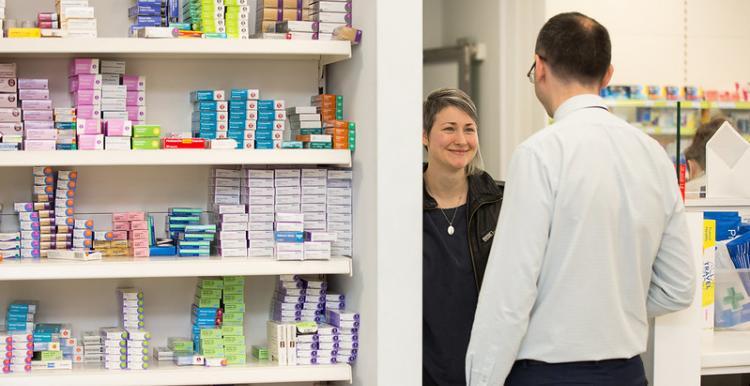 woman in pharmacy woman in pharmacy