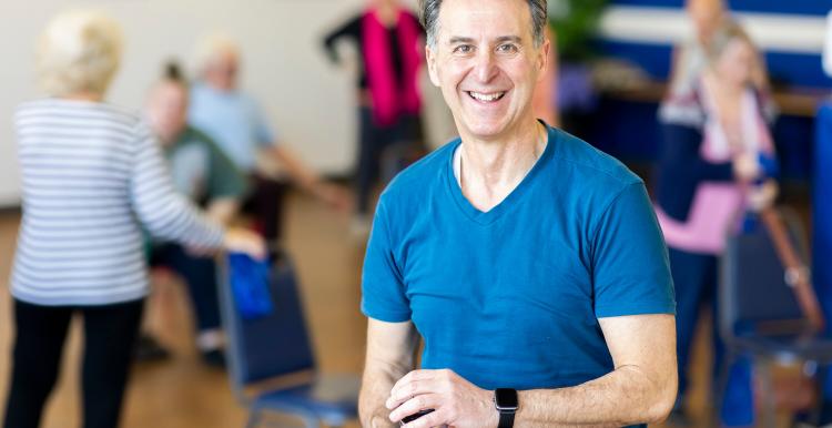 A man in an exercise class