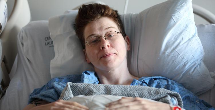 Woman in a hospital bed 