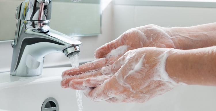 person washing hands