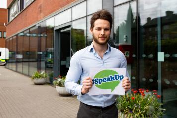 Healthwatch staff member encouraging people to speak up about their views