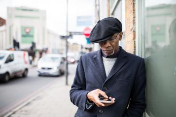 Man using his mobile phone outside