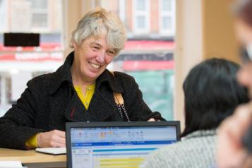 Woman at a reception desk