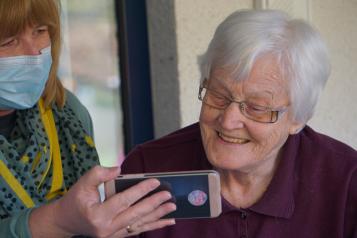 An elderly woman in a care home 