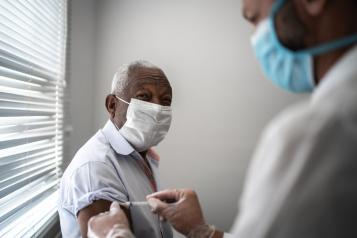 flu-covid-vaccine-vaccination-black-man